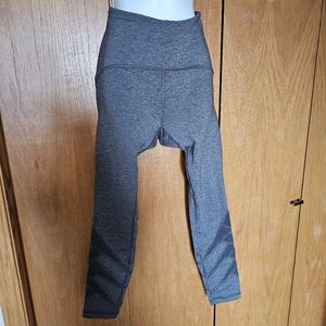 Grey Lululemon size 4 leggings with mesh inserts